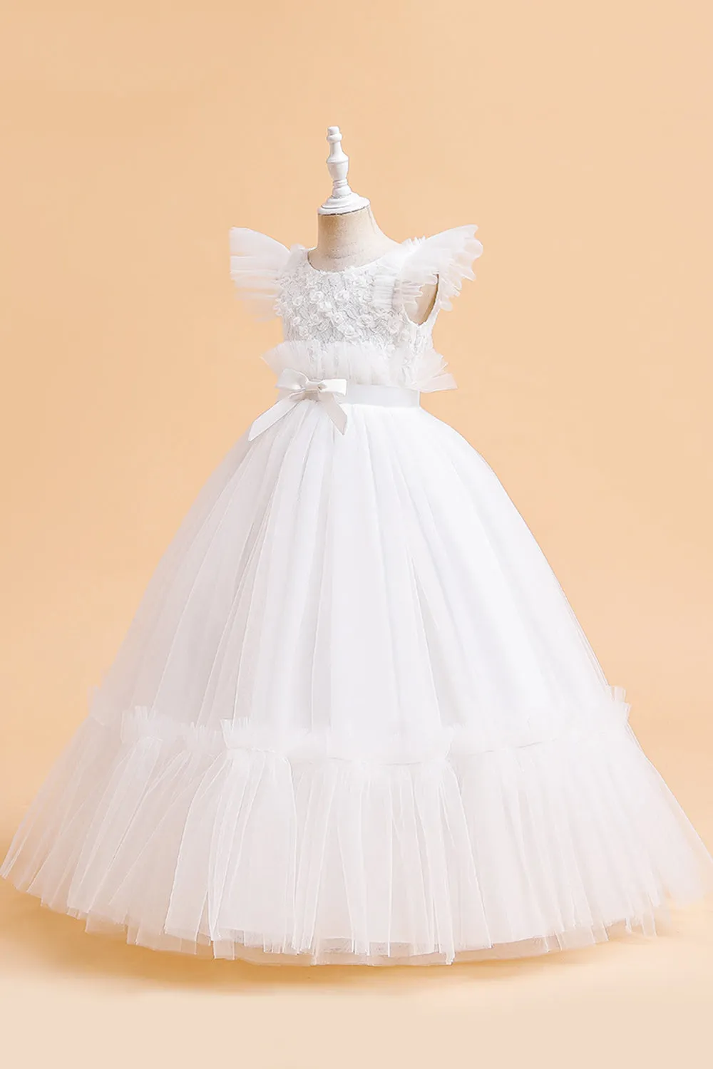 Abito bambina in tulle champagne con fiocco