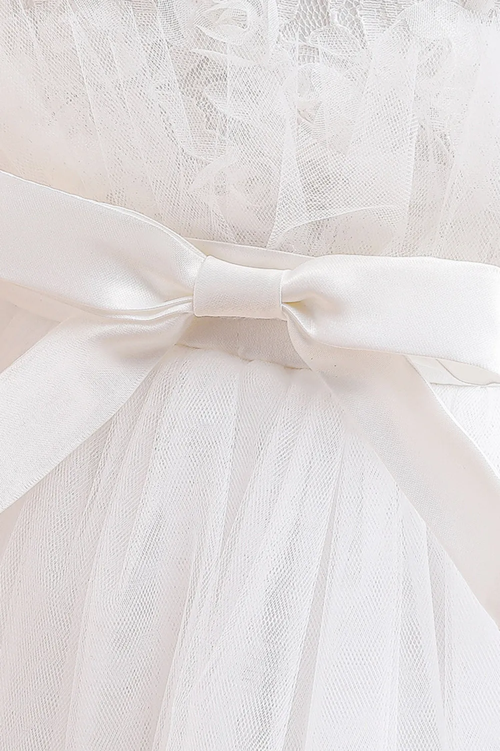 Abito bambina in tulle champagne con fiocco