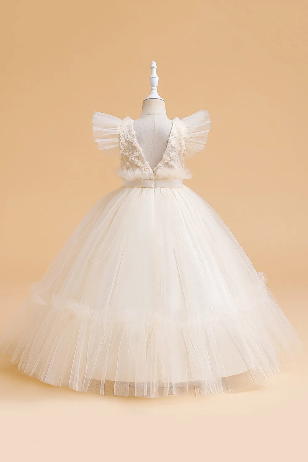 Abito bambina in tulle champagne con fiocco