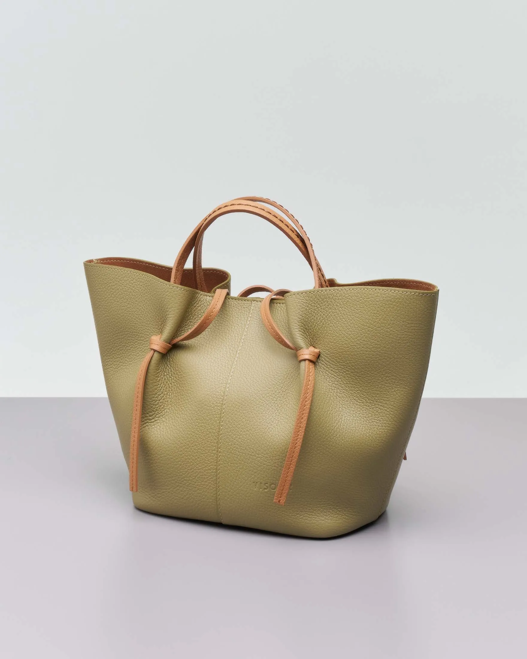 Borsa a mano verde oliva in pelle martellata con manici a contrasto e pochette color cuoio