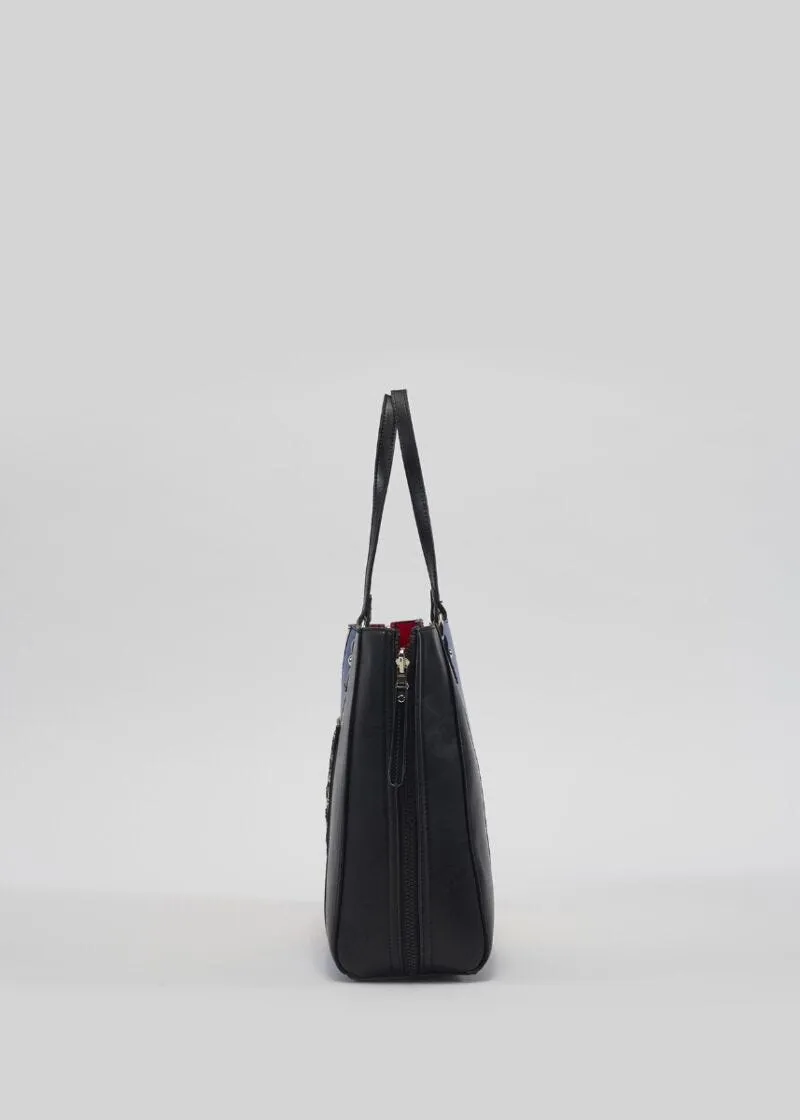 Borsa shoulder con borchie e patch