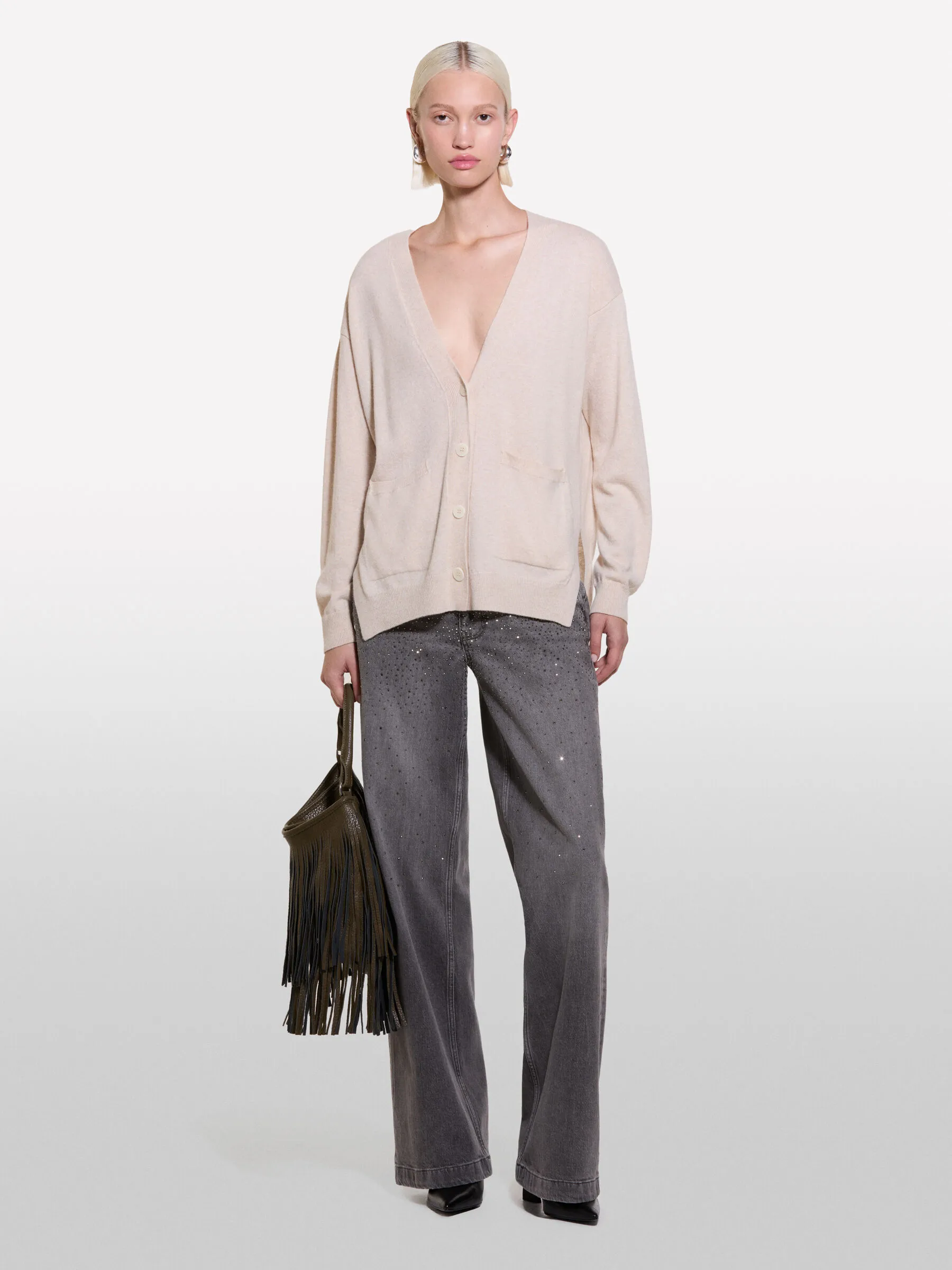 Cardigan beige con spacchi