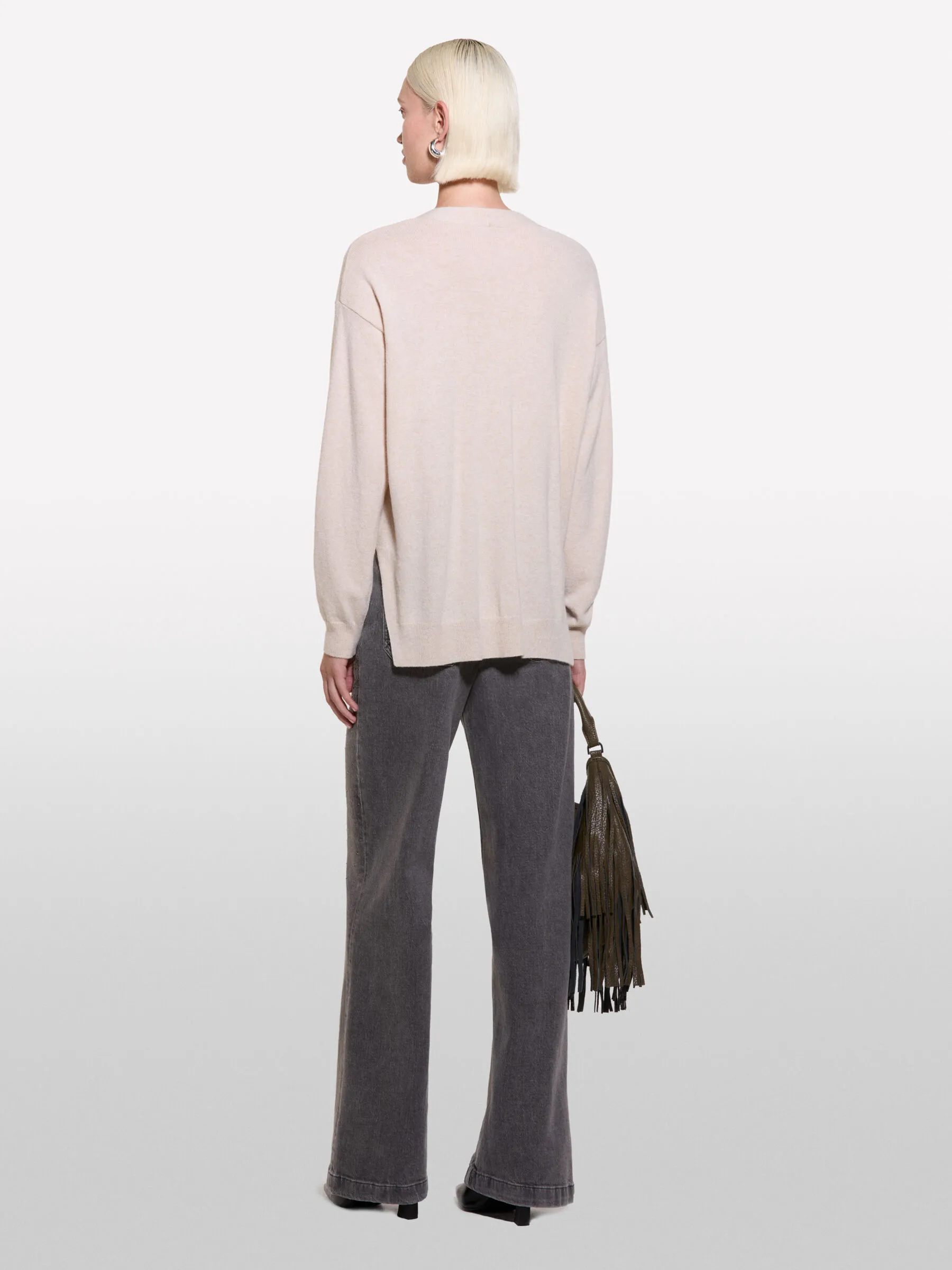 Cardigan beige con spacchi