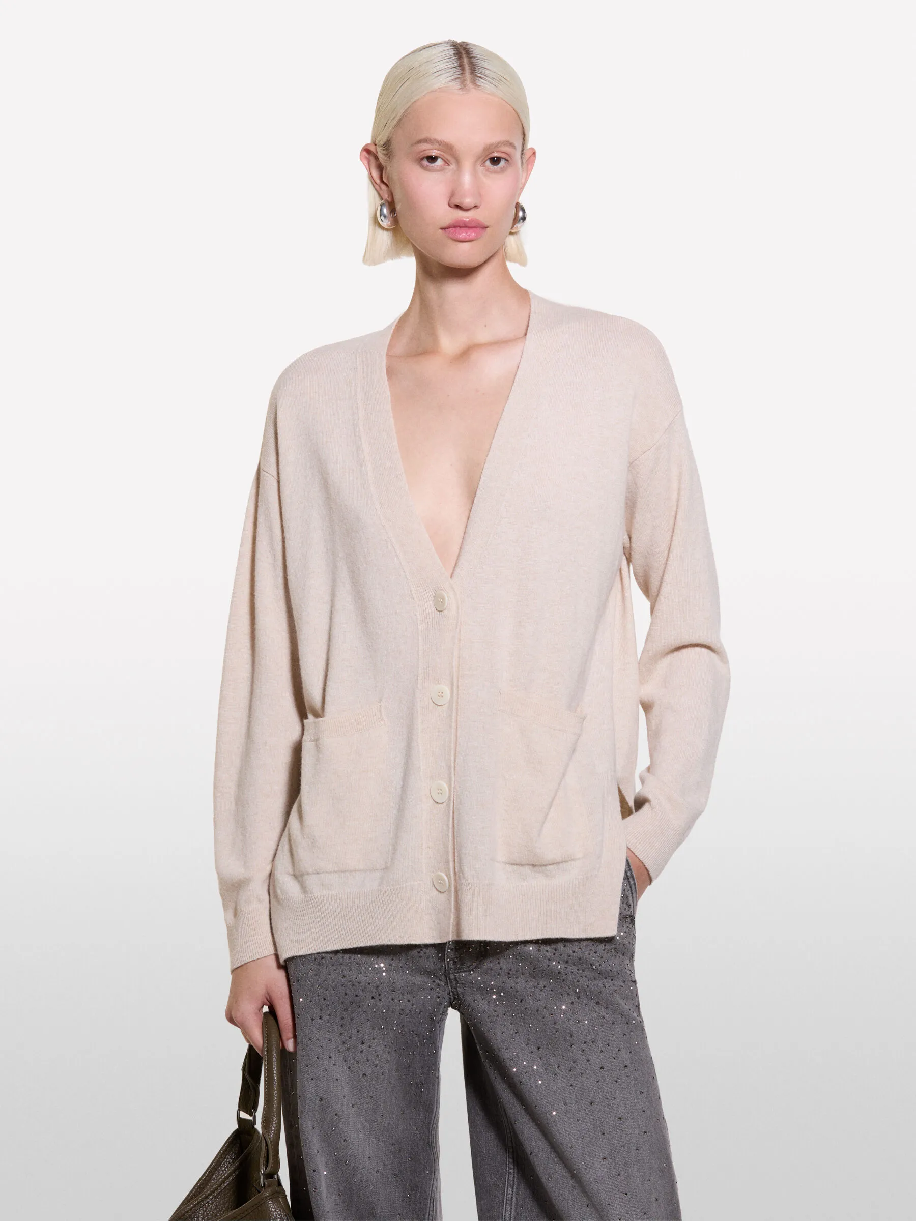 Cardigan beige con spacchi