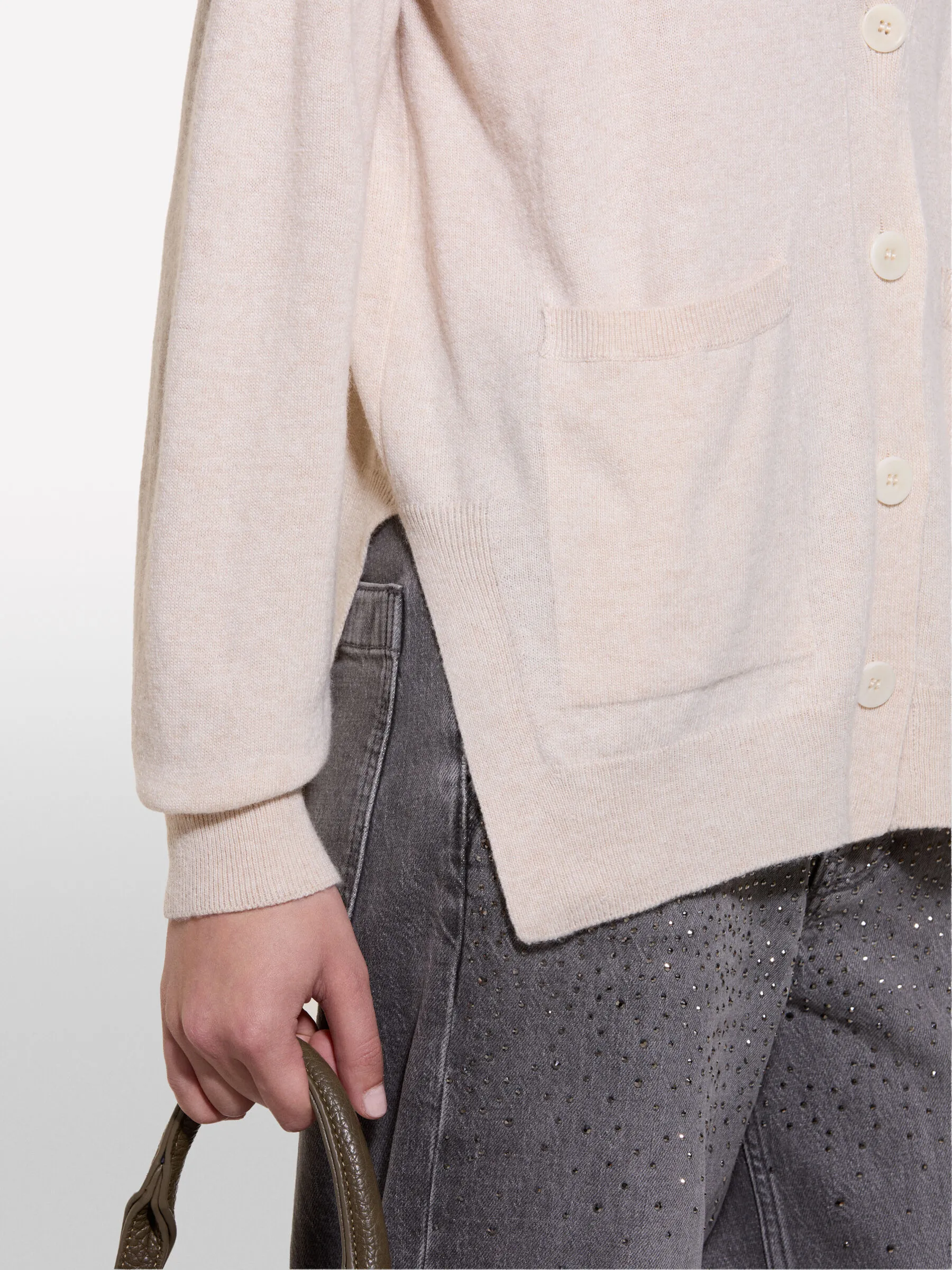 Cardigan beige con spacchi